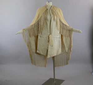 Antique Victorian ruched cape with quilted lining long hand knotted fringe trim