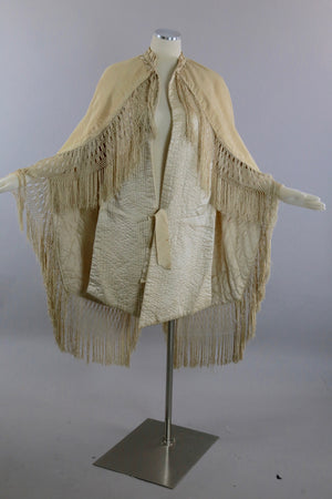 Antique Victorian ruched cape with quilted lining long hand knotted fringe trim